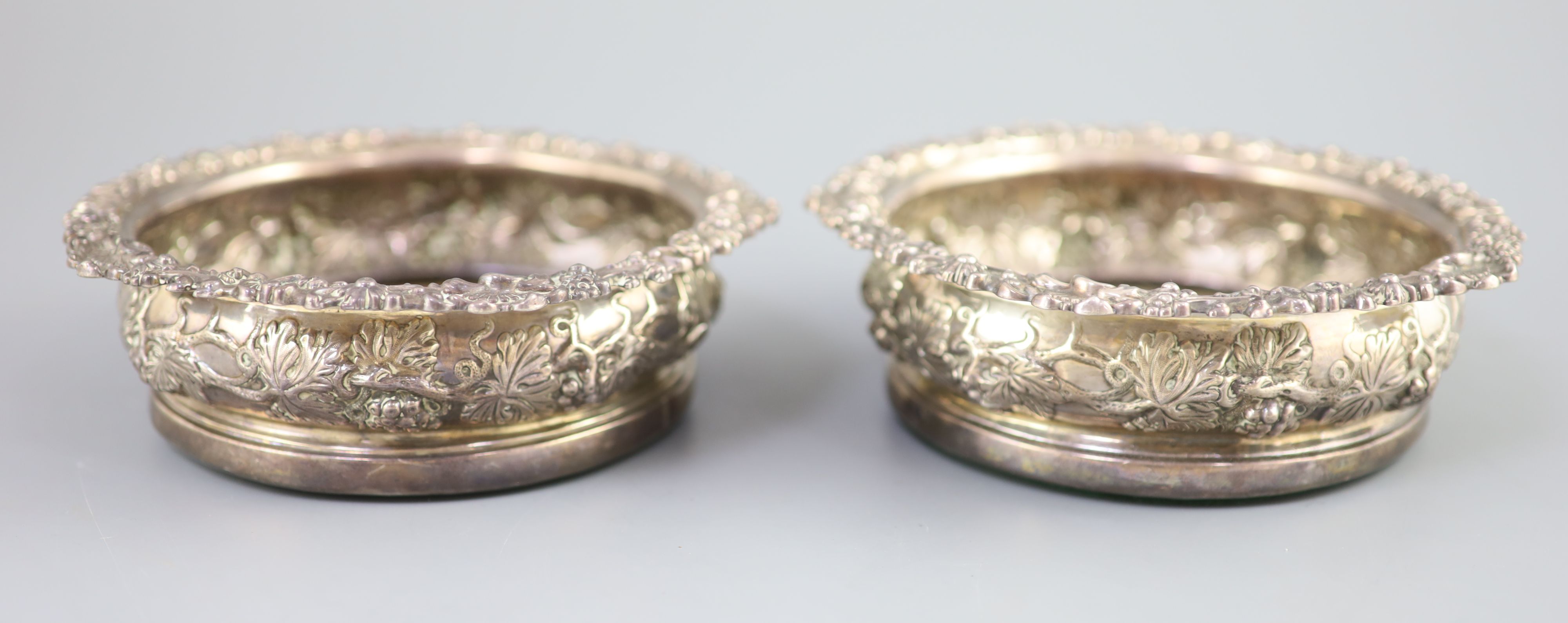 A pair of George IV silver wine coasters, S.C. Younge & Co, Sheffield, 1824, 16.7cm,